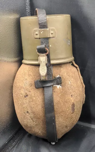 WWII/2 German canteen DHW 37 marked with wool cover, cup, and leather Strap.