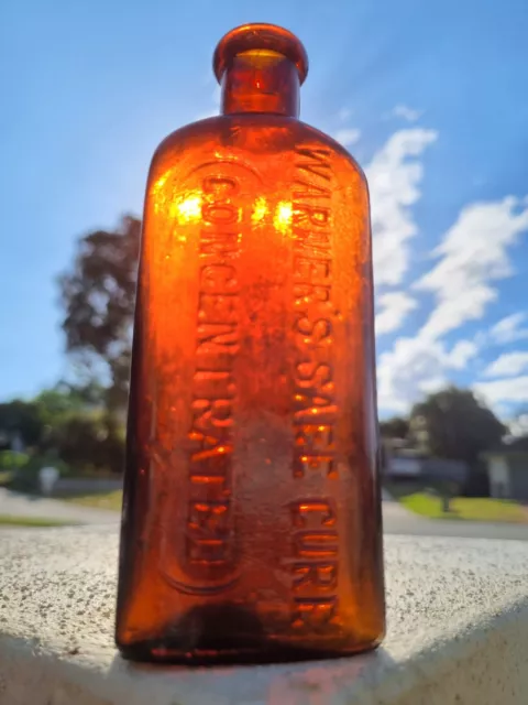 Antique Warners Safe Cure Concentrated glass Bottle