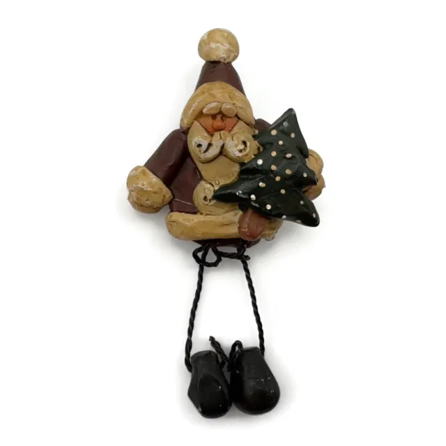 Old World Resin Santa Claus With Dangling Wire Legs Holding a Tree Lapel Pin