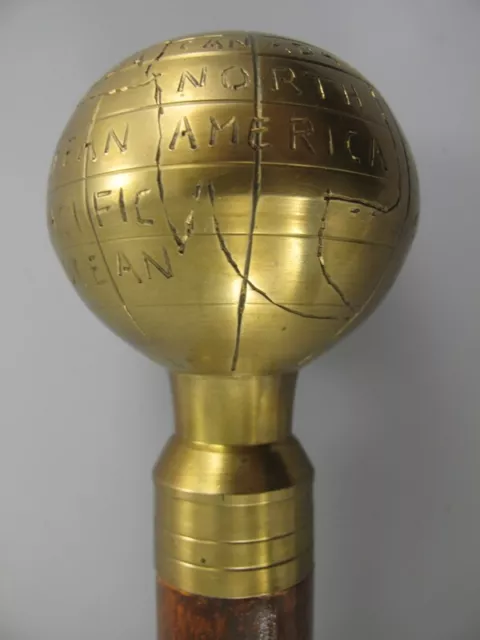 9977646 Bastón Caña Asa Latón Bruñido Globo Globus L92cm