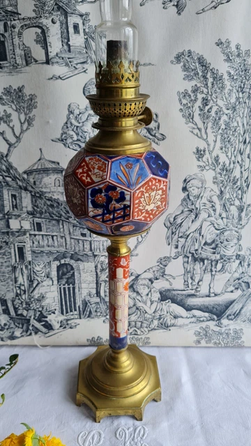 Paire lampes pétrole porcelaine Imari bronze fleurs glands XIXème siècle