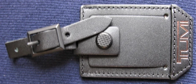 TUMI Tag Black New 3 1/4" x 2 1/8" Bronze Logo