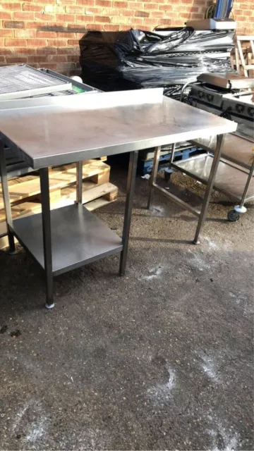 Stainless steel 2 step  work bench table with dishwasher  space 130 cm