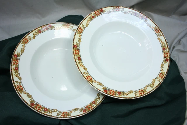 Pareja platos de porcelana. L.C.S.J. Sevilla.