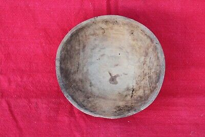 Old antique primitive hand carved round wooden dough bowl trencher tray plate .