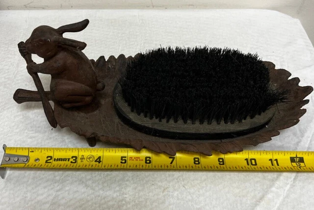 vintage cast iron boot brush scrapper bunny rabbit rowing