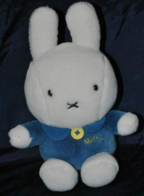 Peluche Doudou Lapin MIFFY Blanc Bleu Bouton Jaune Hochet 25 Cm Assis Etat NEUF