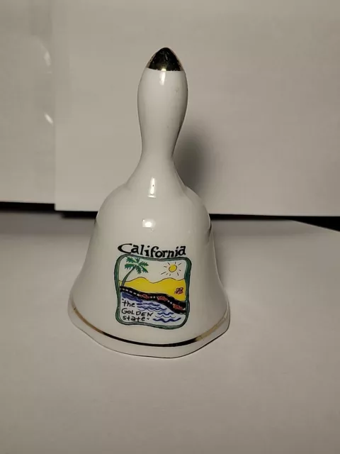 Vintage “California” Porcelain Bell. Bell Ringer intact