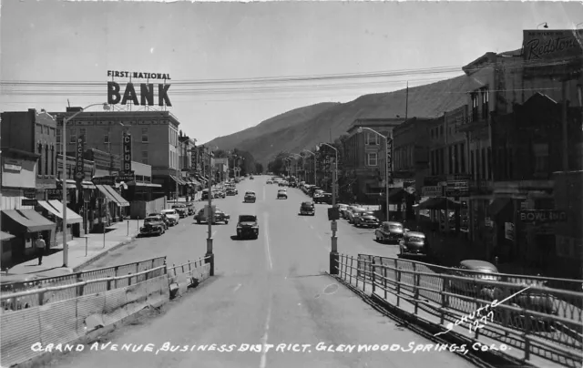 J42/ Glenwood Springs Colorado RPPC Postcard c1940s Grand Ave Stores Bank 245