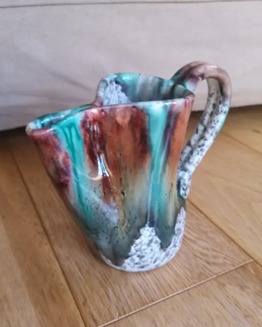 Mid Century Italian Studio Pottery Squashed jug. Multicoloured Drip Glaze Signed
