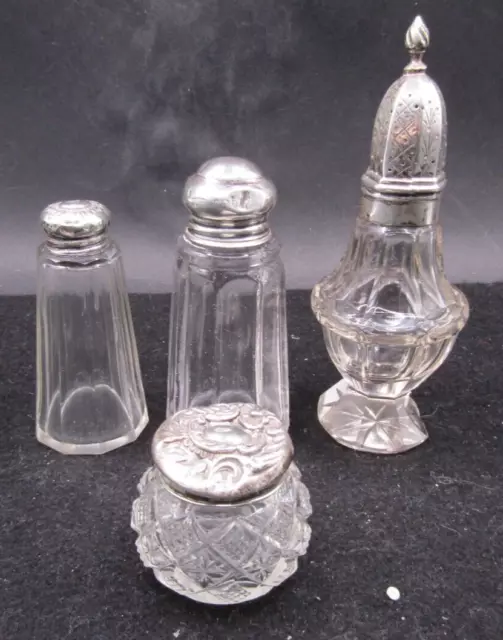 Four Silver Topped Jars