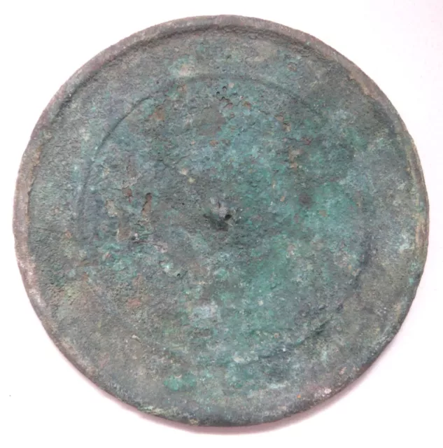 China, Song Dynasty bronze mirror with traces of fabric, light encrustation