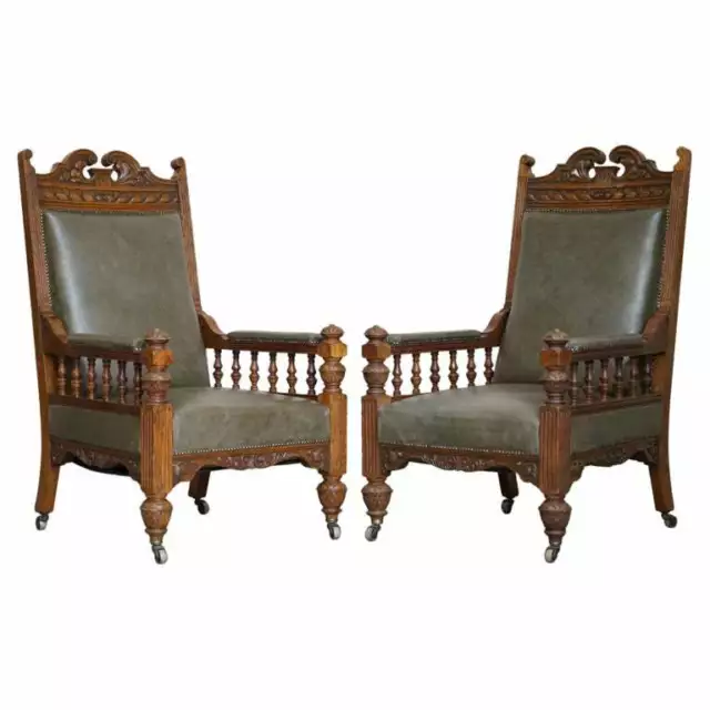 Antique Pair Of Ornately Carved Oak Framed Leather Victorian Throne Armchairs