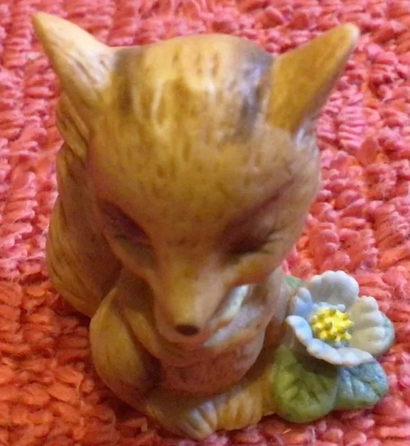 Tiny Red Fox Figurine with Flower