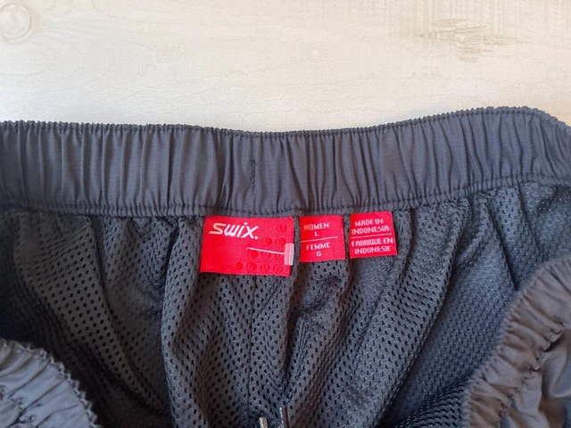 Woman’s Swix black mesh lined polyester pants size Large Woman’s Swix black mesh lined polyester pants size Large