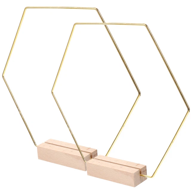 2 juegos de anillos metálicos hexagonales con bases de madera mesa adorno agujas de boda