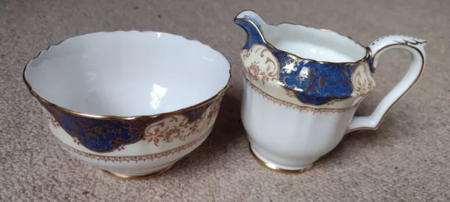 Crown Staffordshire - Milk jug + sugar bowl. A14143. Cobalt blue + gilt. Flowers