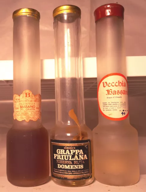 Liquori stock 3 mignon alte a forma di bicchierino grappa diverse