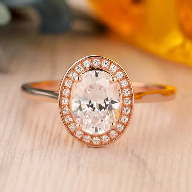 2.29 TCW Oval Cut White Moissanite Halo Wedding Ring In 14k Rose Gold Plated