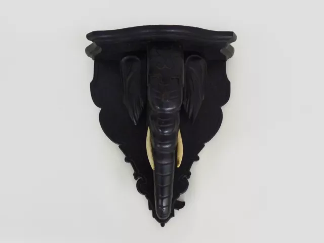 Sellette, porte plante, porte statue mural applique tête d'éléphant en bois noir