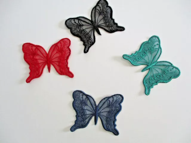 Three sew-on lace embroidered butterflies. 4 colours to choose. Made of organza.