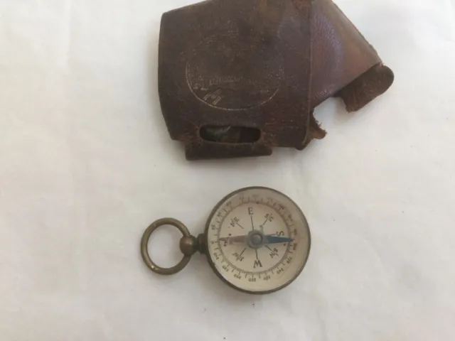 nice old small size 25mm dia vintage pocket compass working, tatty leather cover