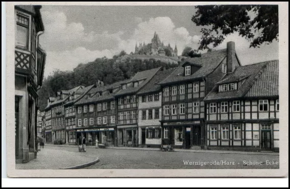 Wernigerode DDR AK 1955 Geschäfte Strassen Partie an der Schöne Ecke Fachwerk