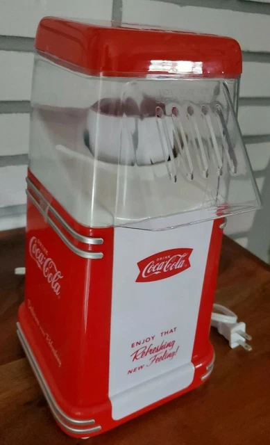 Coca-Cola 2 oz. Red Mini Countertop Popcorn Machine by Nostalgia Coca-Cola 2 oz. Red Mini Countertop Popcorn Machine by Nostalgia