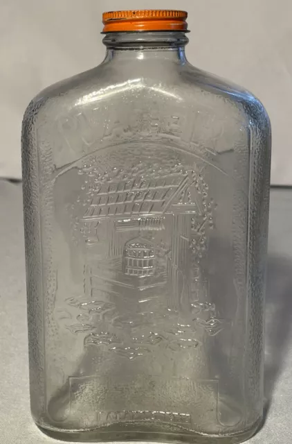 https://www.picclickimg.com/ILkAAOSw1IRj3APC/Vintage-1932-Glass-Water-Bottle-1-QT-Embossed.webp