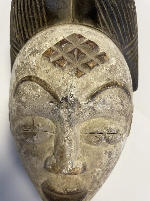 African Mask - Puno Lumbo; Gabon.  Female Spirit