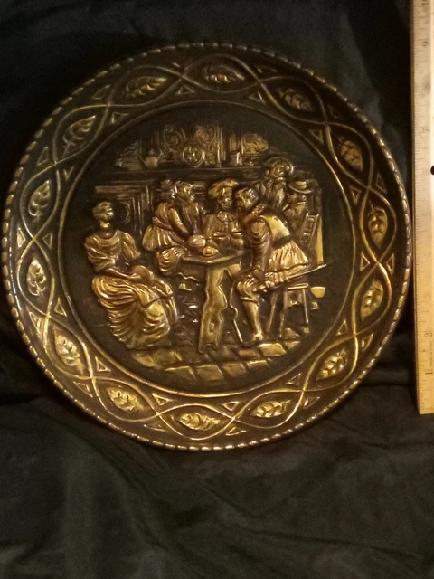 Vintage brass embossed charger flue pipe cover plate repousse metal wall hanging