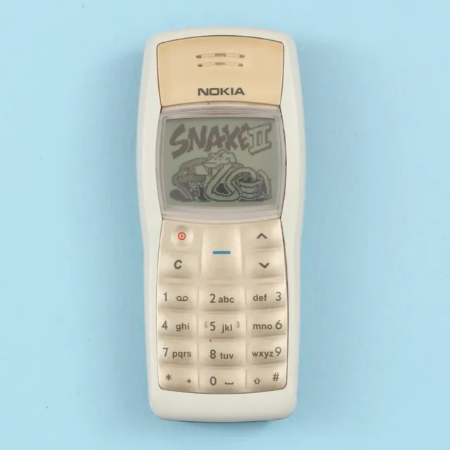 Vintage Nokia 1100 Mobile Phone from 2003 with Charger