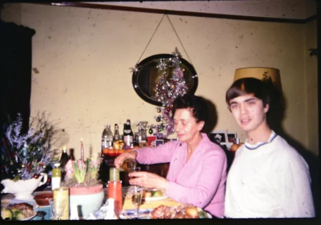 35mm Slide Woman Young Man Drinks Xmas Christmas Meal Kodachrome 1967 DUSTY