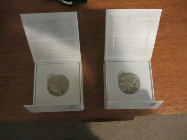 Two Vancouver Olympic Volunteer Medal's new in the box