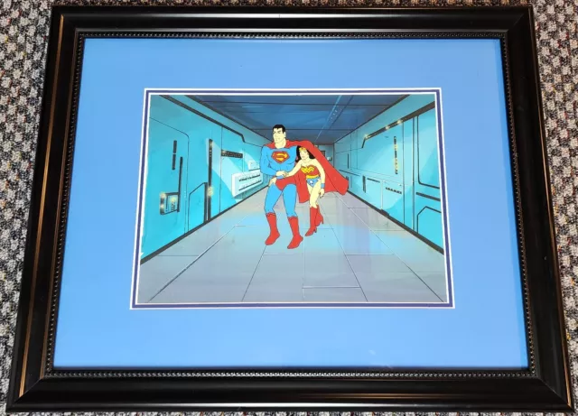 Superfriends Production Animation Cel Of Superman And Wonder Woman Framed On Obg