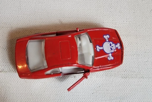 Vintage 1990s Diecast Toy Matchbox Ripper BMW 850i Red 1992 Skull Crossbones