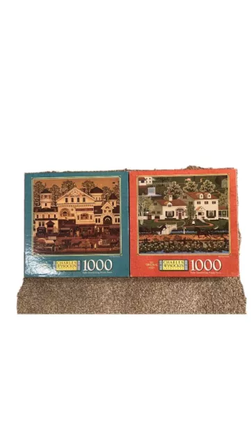 Lot of (2) NEW Charles Wysocki 1000 Piece Puzzles: Welcome Home, Old Main Street