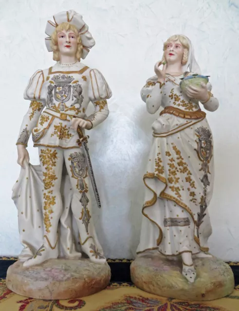 Antica coppia di statue in porcellana biscuit XIX secolo