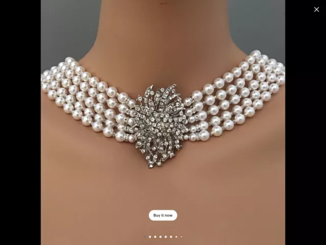 Audrey Hepburn, Breakfast at Tiffany’s Necklace With Brooch And Earrings Audrey Hepburn, Breakfast at Tiffany’s Necklace With Brooch And Earrings