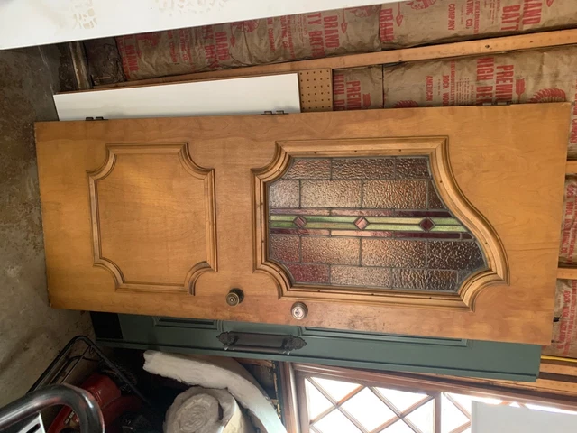 vintage wood door with stained glass