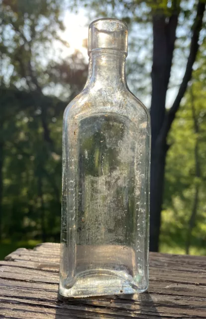 W.F. Severa, Cedar Rapids, Iowa clear bitters bottle 3