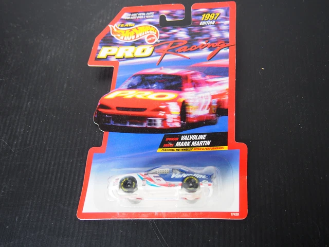 2 Pit crew collections, Hot Wheels car a day calendar and DeWalt racing