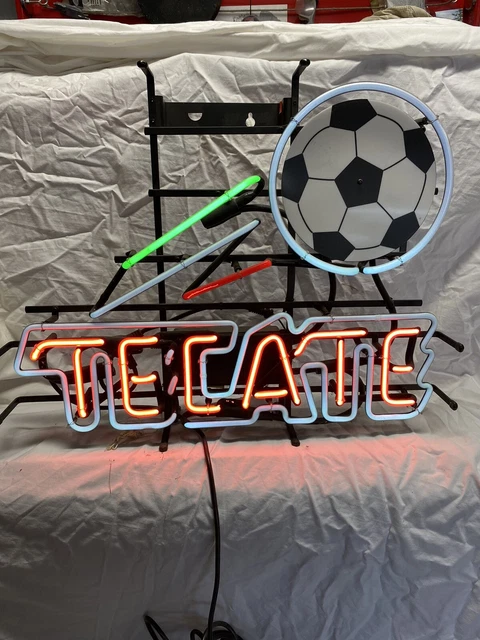 Tecate neon beer sign with rotating soccer ball