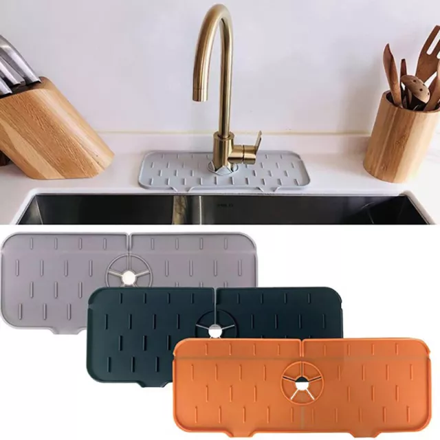 https://www.picclickimg.com/IgoAAOSwmkFia0~-/Kitchen-Silicone-Faucet-Mat-Sink-Splash-Guard-Faucet.webp