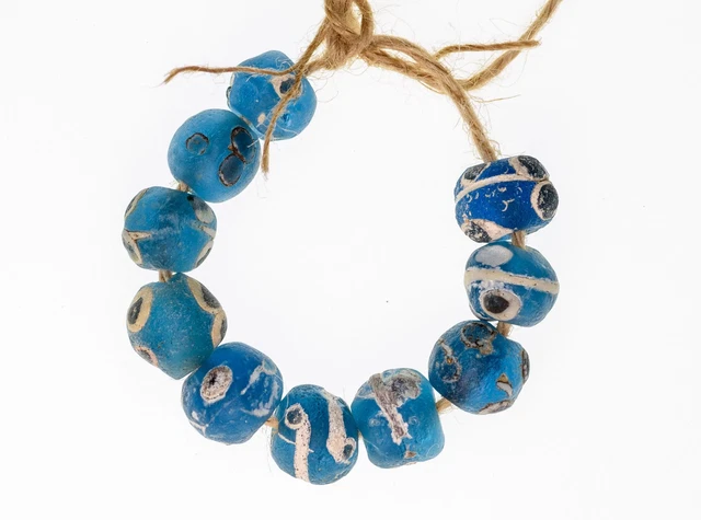 A short strand of 10 Large Ancient Islamic Period Blue Evil Eye Beads 0008