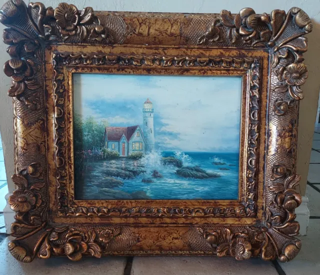 Large Framed Lighthouse Print In Ornate Golden Frame.