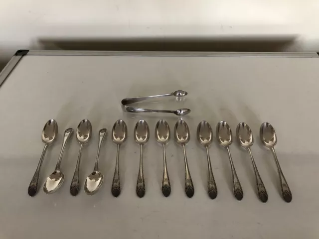 Uncased Set Of 12 Sterling Silver Coffee Spoons And Matching Tongs (London 1886)