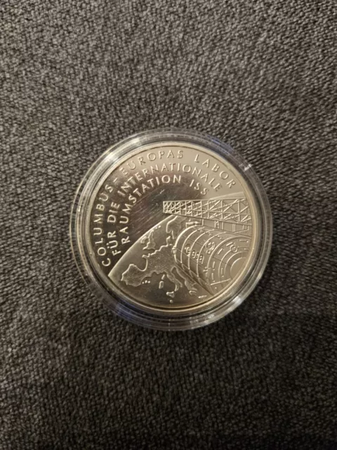 10 Euro Gedenkmünze Columbus/Raumstation ISS 2004 D - in Kapsel