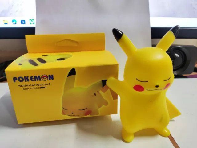 Pokemon Luce Notturna + Box Pikachu Versione 2