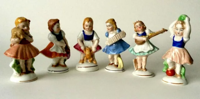 1940'S  Porcelain  Six Young Girl Figurines With Musical Instruments Or Animals